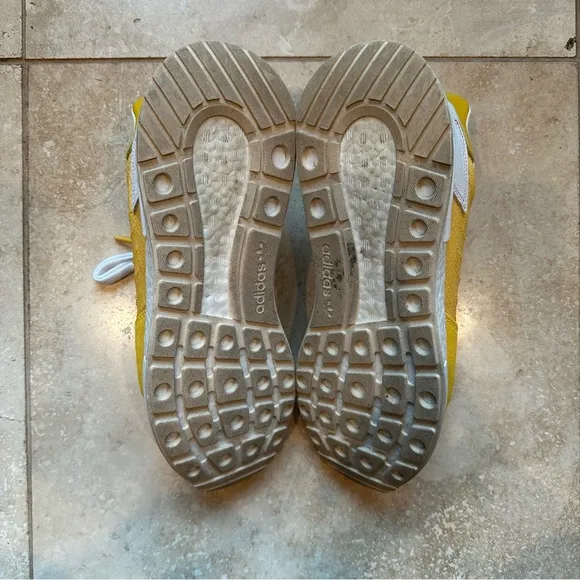 Men’s Adidas ZX 500 RM shoes in yellow.