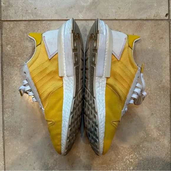 Men’s Adidas ZX 500 RM shoes in yellow.