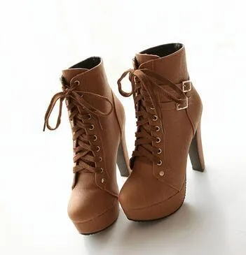 The patent leather block heel ankle boot.