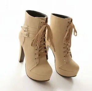 The patent leather block heel ankle boot.